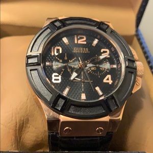 Guess black and rose gold watch.